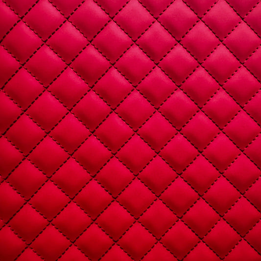 Red quilted fabric with diamond pattern